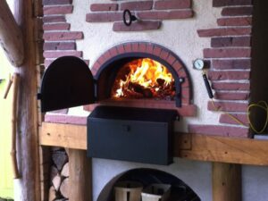 Four à bois Le Marmiton installé sous abri