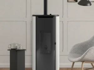 Poêle à granulés canalisable MCZ Mini 8,1 kW Comfort Air installé contre un mur clair